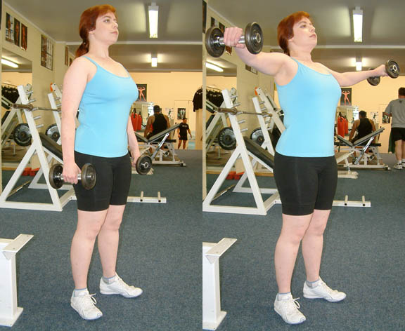 Standing dumbbell lateral raise at about shoulder height.